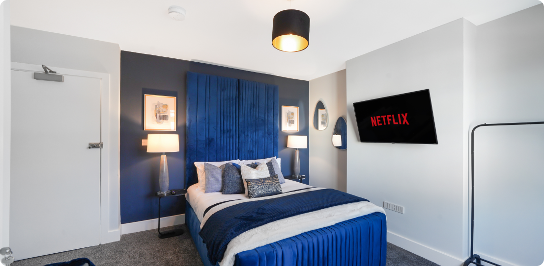 Bedroom with Netflix on TV